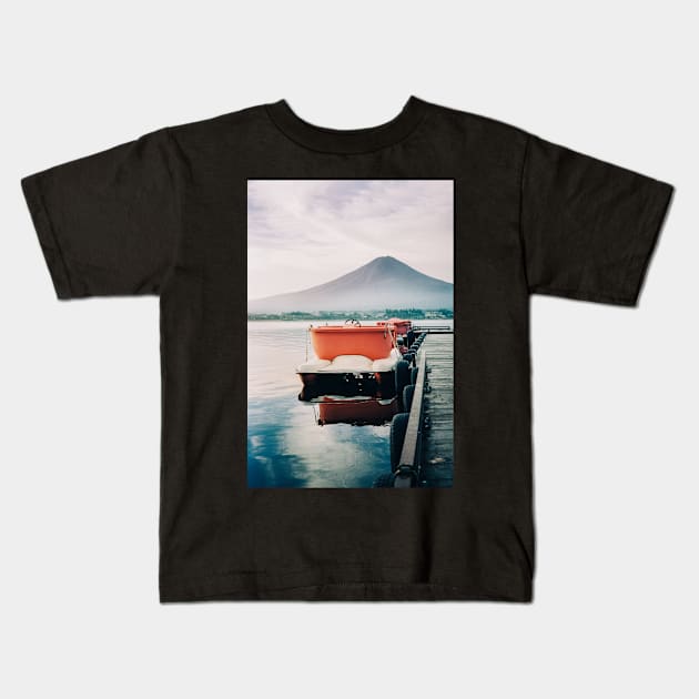 Paddleboats Tied to Wooden Pier in Early Morning Light Kids T-Shirt by visualspectrum